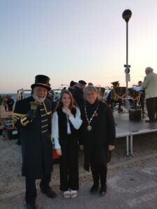 (left to right) Seaford Town Crier, Peter White, Seaford Rotarians Poetry Competition winner, Amelia Pook, and The Mayor of Seaford, Cllr Sally Markwell.